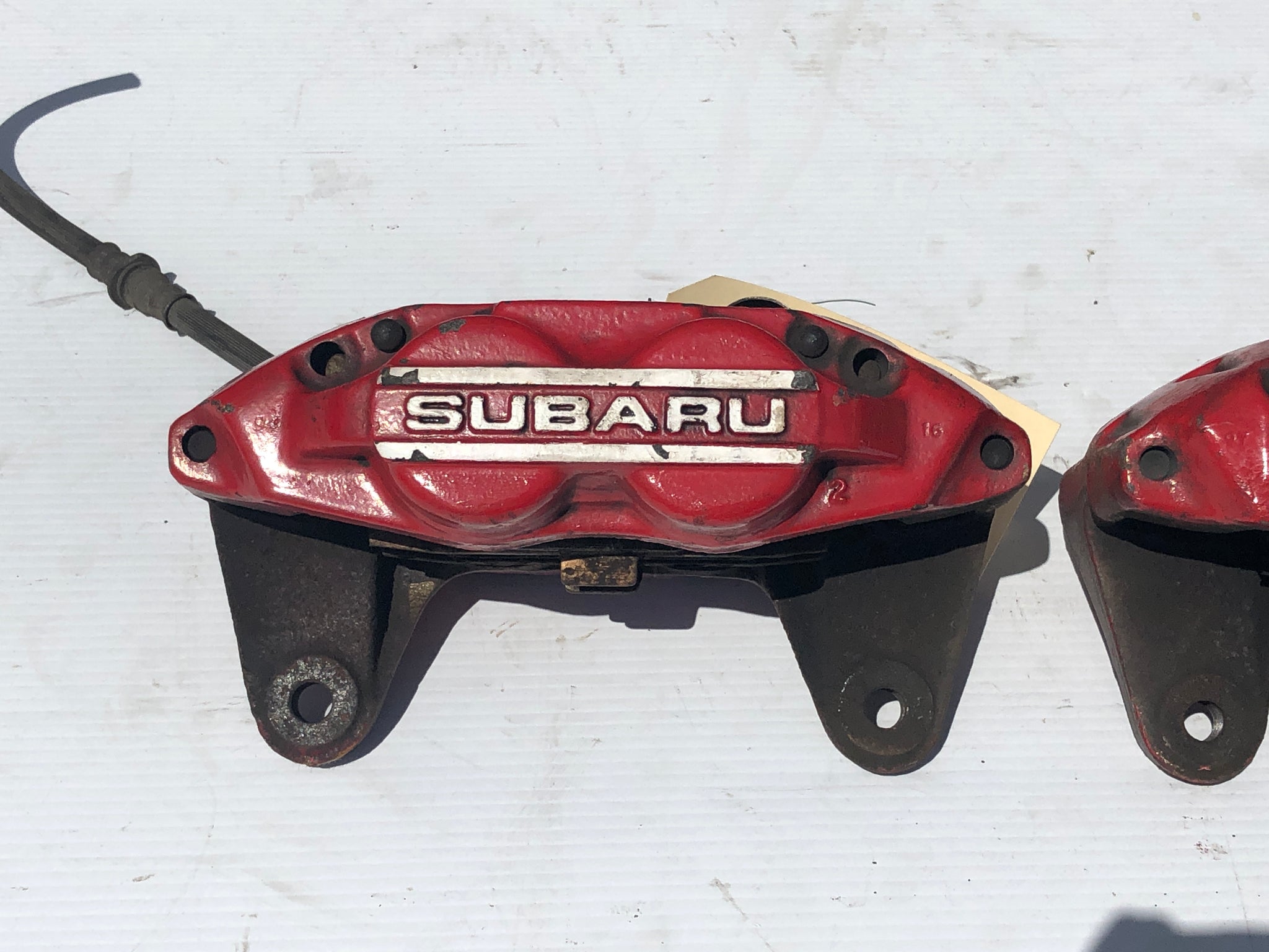 Genuine SUBARU WRX OEM RED SUBARU 2 PISTON BRAKE CALIPER Rear Set Pair Genuine SUBARU WRX OEM RED SUBARU 2 PISTON BRAKE CALIPER Rear Set Pair